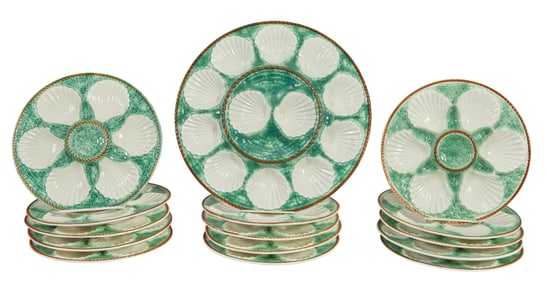 French Provincial Fifteen Piece Majolica Oyster Set, 19th c., Plates- H.- 1 1/8 in., Dia.- 9 3/8 in.