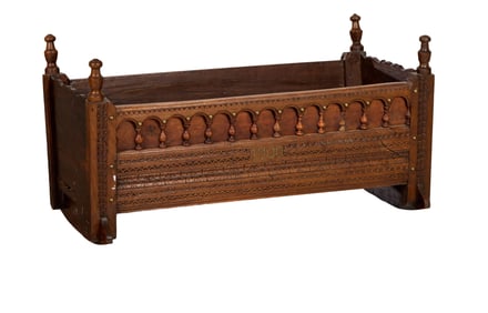 French Provincial Louis Philippe Style Carved Pine and Oak Cradle, 19th c., H.- 20 3/4 in., W.- 40