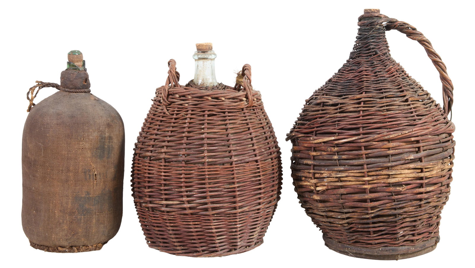 Group of Three French Blown Glass Wine Carboys, 19th c., Largest- H.- 22 in., Dia. 14 in. (3 Pcs.): Group of Three French Blown Glass Wine Carboys, 19th c., two with woven straw enclosures, Largest- H.- 22 in., Dia. 14 in. (3 Pcs.)