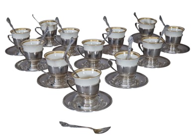 Set of Twelve International Sterling Demitasse Cups, early 20th c., App. Total Sterling Wt.- 27.65