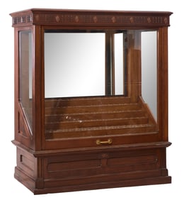 Monumental American Carved Walnut Cane Display Cabinet, late 19th c., H.- 78 in., W.- 67 1/2 in.,
