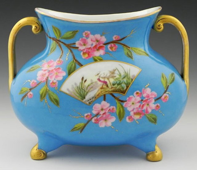 Franco Bohemian Two-Handled Porcelain Garniture Vase, t: Franco Bohemian Two-Handled Porcelain Garniture Vase, third quarter 19th century, in the aesthetic taste featuring birds, flowers and fish, set to a sky blue ground with gilded handles and feet, H.- 9