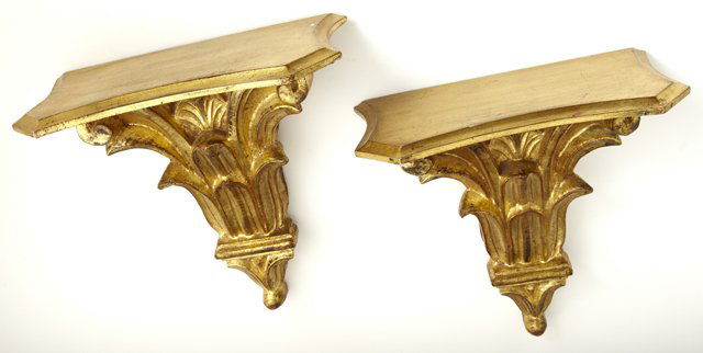 Pair of Carved Gilt Wood Florentine Brackets, 20th c., : Pair of Carved Gilt Wood Florentine Brackets, 20th c., the sheped stepped shelves on leaf carved supports, H.- 10 1/4 in., W.- 10 in., D.- 5 in.