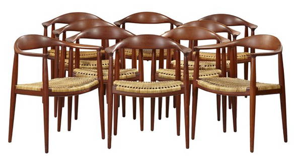 Set of Ten Hans Wegner "The Chair" Carved Teak Arm Chai: Set of Ten Hans Wegner "The Chair" Carved Teak Arm Chairs, c. 1950, with caned seats, the undersides marked "Johannes Hansen, Copenhagen," H.- 30 1/4 in.