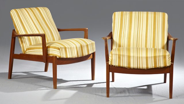 Pair of Finn Juhl Danish Modern Carved Teak Arm Chairs,: Pair of Finn Juhl Danish Modern Carved Teak Arm Chairs, c. 1960, each with an enamel disc for France & Son, #6302928, and #6302930, and a metal disc for John Stuart, the retailer, H.- 29 1/2 in.