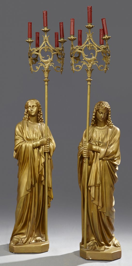 Pair of Gilt Plaster Religious Floor Lamps, early 20th : Pair of Gilt Plaster Religious Floor Lamps, early 20th c., the pierced five light lamps with fleur-de-lis decoration, upheld by robed female acolytes, H.- 64 in., W.- 16 in., D.- 10 in.