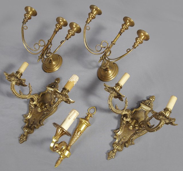 Group of Five Sconces, 19th c., consisting of a pair of: Group of Five Sconces, 19th c., consisting of a pair of bronze two light examples with floriform bobeches; a pair of brass three light examples, not electrified; and a Louis XVI stlye single light exa