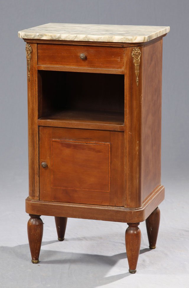 Louis XVI Style Ormolu Mounted Marble Top Nightstand, e: Louis XVI Style Ormolu Mounted Marble Top Nightstand, early 20th c., with a mottled white marble over a frieze drawer and open storage above a porcelain lined pot cupboard, the whole on turned tapered