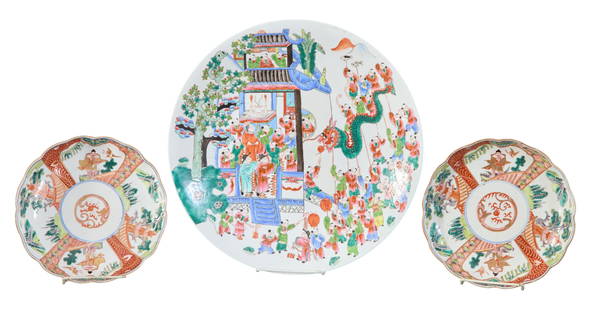 Three Asian Dishes, 19th c., Platter- H.- 1 1/2 in., Dia.- 13 1/8 in.; Plates- H.- 1 1/2 in., Dia.-: Three Asian Dishes, 19th c., consisting of a pair of Oriental Imari Arita plates with scalloped edges and figural landscape decoration and a large Famille Rose charger, with dragon and figural decorat