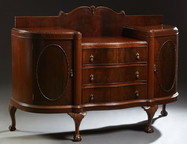 Carved Mahogany Serpentine Bow Front Sideboard, early 20th c., H.- 50 3/4 in., W.- 74 in., D.- 26