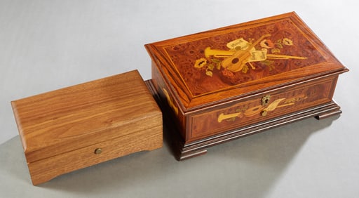 Two Swiss Reuge Carved Walnut Music Boxes, 20th c. Verdi- H.- 3 in., W.- 8 in., D.- 4 3/8 in.,