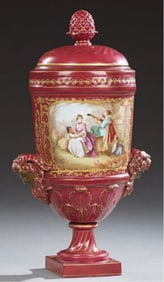 Sevres Style Porcelain Covered Urn, late 20th c., H.- 24 1/2 in., W.- 14 3/4 in., D.- 9 1/2 in.