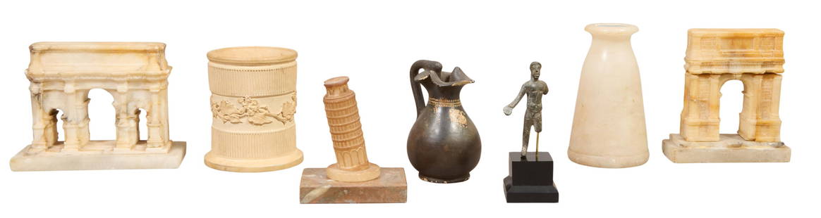 Seven Pieces of Classical Decoration, 19th c., Arch- H.- 4 1/2 in., W.- 4 in., D.- 1 5/8 in. (7: Seven Pieces of Classical Decoration, 19th c., consisting of a pair of marble Wellington Arch paperweights; a marble Leaning Tower of Pisa on a brown marble plinth; a marble pencil cup with relief lea
