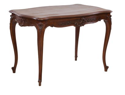 French Louis XV Style Carved Walnut Center Table, early 20th c., H.- 29 1/2 in., W.- 45 in., D.- 28: French Louis XV Style Carved Walnut Center Table, early 20th c., the moulded turtle top over a carved rocaille apron, one drawer on short side, on raised scrolled cabriole legs, H.- 29 1/2 in., W.- 45