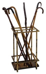 Group of Seven Walking Canes in Stand, 20th c., Stand- H.- 22 in., W.- 13 1/2 in., D.- 9 1/2 in.;