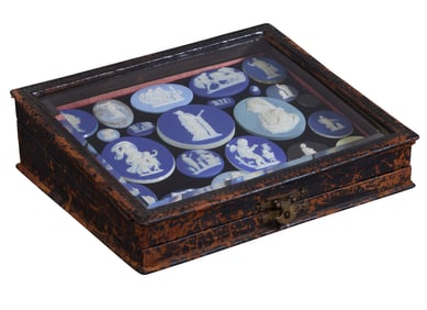 Group of Twenty-Five Wedgwood Plaques, 18th/19th c., Largest- Dia.- 2 1/2 in.; Case- H.- 3 in., W.-9