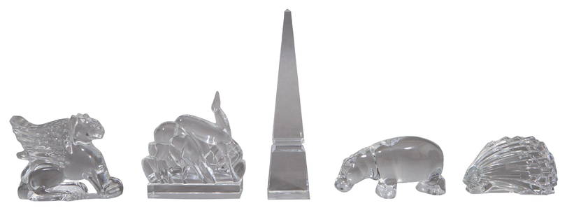 Group of Five Pieces of Baccarat Crystal, 20th c., Obelisk- H.- 10 in., W.- 2 1/8 in. (5 Pcs.): Group of Five Pieces of Baccarat Crystal, 20th c., consisting of two deer; a hedgehog; a winged lion; an obelisk; together with a hippopotamus; each with a Baccarat stamp, Obelisk- H.- 10 in., W.- 2