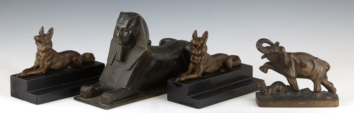 Group of Four Metal Cabinet Pieces, 20th c., Sphinx- H.- 6 in., W.- 3 1/8 in., D.- 10 1/2 in. (4