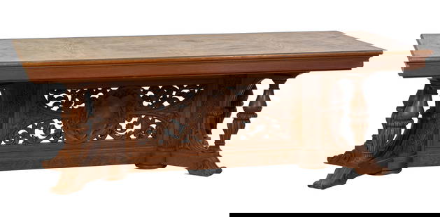 French Renaissance Revival Carved Walnut Library Table, 19th c., H.- 29 in., W.- 98 1/2 in., D.- 47: French Renaissance Revival Carved Walnut Library Table, 19th c., the rectangular parquetry top with cyma apron, robust round diapered rosette standards joined by a pierced acanthus scrolled panel with