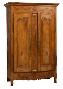 French Provincial Louis XIV Style Carved Oak Armoire, mid 19th c., H.- 88 in., W.- 58 in., D.- 27: French Provincial Louis XIV Style Carved Oak Armoire, mid 19th c., the moulded cornice above a foliate spray flanking an eagle medallion, two raised panel spurred doors, central pilaster stile with vi