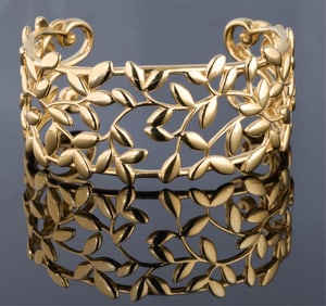 Tiffany & Co. 18K Yellow Gold Paloma Picasso Olive Leaf Bangle Bracelet, 20th c., App. Total Wt.-