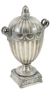 Rare Silver Plate Clad Wedgwood Tea Caddy, 19th c., H.- 9 in., W.- 5 1/2 in.: Rare Silver Plate Clad Wedgwood Tea Caddy, 19th c., with a Wedgwood liner and rams head handles, with an acorn handle on the lid, on a socle support to a relief plinth base, H.- 9 in., W.- 5 1/2 in. P