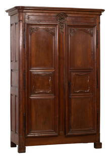 French Louis XIV Style Walnut Armoire, 19th c., H.- 98 1/4 in., W.- 64 in., D.- 28 in.: French Louis XIV Style Walnut Armoire, 19th c., the stepped cornice over rocaille framed cartouche with carved floral basket, two raised panel doors with acanthus spandrel decoration, curved stiles in