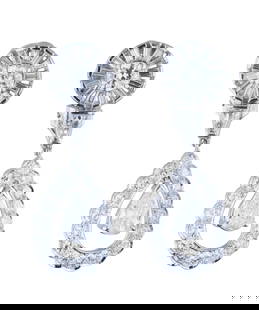 Pair of Platinum Diamond Pendant Earrings, Total Diamond Wt.- 5.75 carats, Each- H.- 1 1/2 in., W.-: Pair of Platinum Diamond Pendant Earrings, the stud with a central .45 ct. round diamond within a pierced sunburst border of baguette diamonds, suspending a triangular diamond mounted drop and a diamo