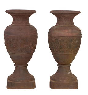 Large Classical Baluster Form Cast Iron Garden Urns, early to mid 20th c., Each- H.- 51 in., W.- 19: Large Classical Baluster Form Cast Iron Garden Urns, early to mid 20th c., the flared rim over floral rim, mythological frieze surround with flowering vine, on flared fluted base, Each- H.- 51 in., W.