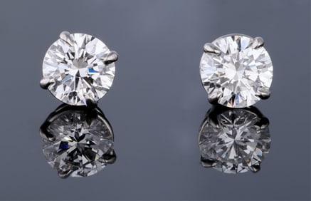 Pair of Platinum Diamond Stud Earrings, Total Diamond Wt.- 1.43 carats (2 Pcs.)