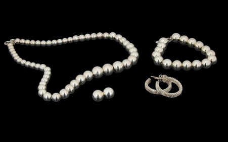 Four Pieces of Tiffany & Co. Sterling Silver Jewelry, Bracelet- L.- 7 in.; Necklace- L.- 16 in.;