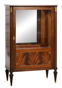 French Louis XVI Style Marble Top Walnut Vitrine, 20th c., H.- 57 1/2 in., W.- 37 in., D.- 19 1/2: French Louis XVI Style Marble Top Walnut Vitrine, 20th c., the moulded shaped marble top with turret corners, single glazed door, mirrored back interior, lower flame walnut panel flanked by reeded sti