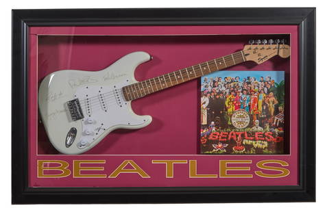 Beatles Autographed Squier Guitar, Overall- H.- 28 3/4 in., W.- 44 3/4 in., D.- 4 in.: Beatles Autographed Squier Guitar, signed by all four Beatles on the body/soundboard, presented with a cover album facsimile of "Seargent Pepper's Lonely Hearts Club Band," in an ebonized composite wo