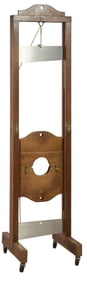 Magic Trip Iron and Wood Guillotine, 20th c., H.- 76 in., W.- 19 in., D.- 20 in.
