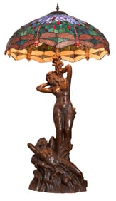 Tiffany Style Stained Glass Bronze Figural Lamp, 20th c., H.- 45 in., W.- 25 in., D.- 25 in.