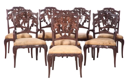 Eight French Art Nouveau Carved Walnut 'Grapevine' Dining Chairs, early 20th c., Each- H.- 38 in.,