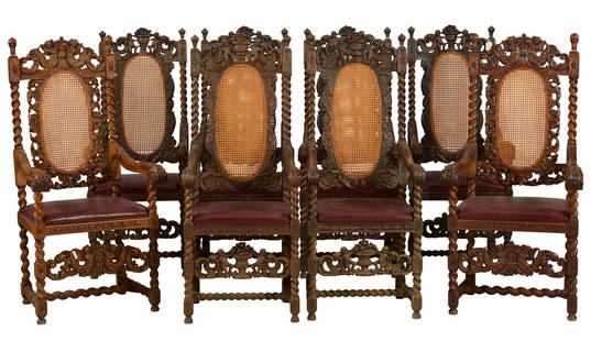 Eight Associated Renaissance Revival Carved Oak Arm Chairs, 20th c., H.- 55 in., W.- 22 in., D.- 20: Eight Associated Renaissance Revival Carved Oak Arm Chairs, 20th c., fruit filled urn with putti carved flanked by floral rocaille scrolls, oval caned back, finialed barley twist stiles, scrolling aca