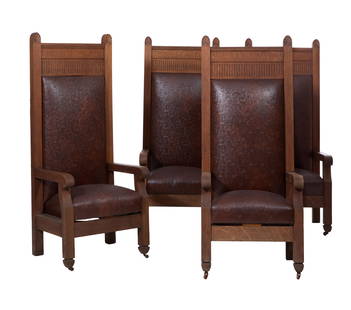Four American Mission Style Carved Oak Throne Chairs, early 20th c., H.- 66 in., W.- 27 1/2 in., D.-: Four American Mission Style Carved Oak Throne Chairs, early 20th c., the anthemion finialed tall backs with fluted entablature, scrolled arms, straight legs, tapered feet, casters, embossed leather up