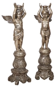 Pair of Silvered Metal Cherub Floor Torchieres, 20th c., Each- H.- 61 in., W.- 15 in., D.- 18 in. (2