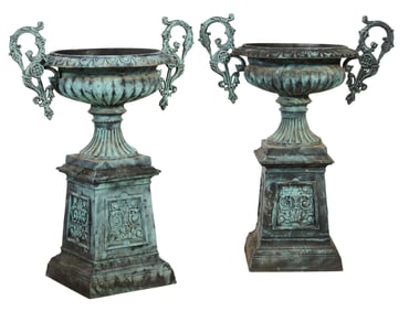 Pair of Vert Cast Metal Urns on Stands, 20th c., H.- 50 in., W.- 38 in., D.- 26 in., (2 Pcs.)