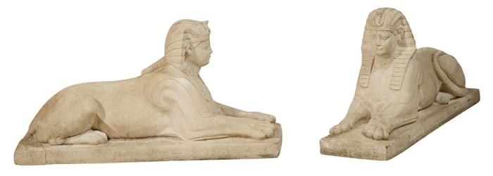 Pair of Cast Stone Sphinx, 20th c., H.- 21 in., W.- 12 in., D.- 40 in. (2 Pcs.)