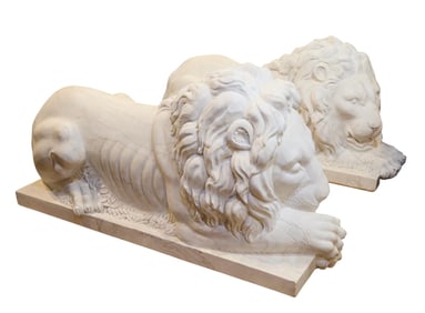 Pair of Large Marble Recumbent Lions, 20th c., Each- H.- 33 in., W.- 23 1/2 in., D.- 62 in. (2 Pcs.)