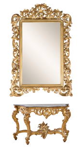 Large Italian Rocaille Marble Top Gilt Console and Mirror, 19th c., Table- H.- 39 in., W.- 62 1/2: Large Italian Rocaille Marble Top Gilt Console and Mirror, 19th c., the monumental mirror with a gilt wood pierced rococo foliate border over the console base with moulded gris serpentine marble top o