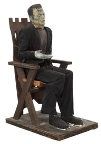 Life-Sized Seated Frankenstein Automaton, 20th c., H.- 56 in., W.- 29 1/2 in., D.- 41 in.