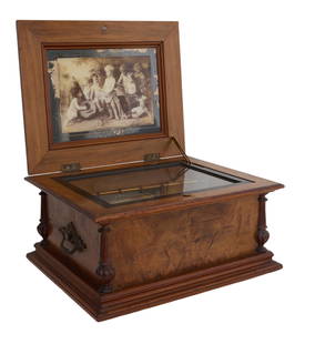 German Marquetry Inlaid Burled Walnut Symphonium Disc Music Box, early 20th c., H.- 10 1/4 in., W.-: German Marquetry Inlaid Burled Walnut Symphonium Disc Music Box, early 20th c., with crank, the interior of the lid with a black and white print of musical cherubs, with one disc, playing, H.- 10 1/4