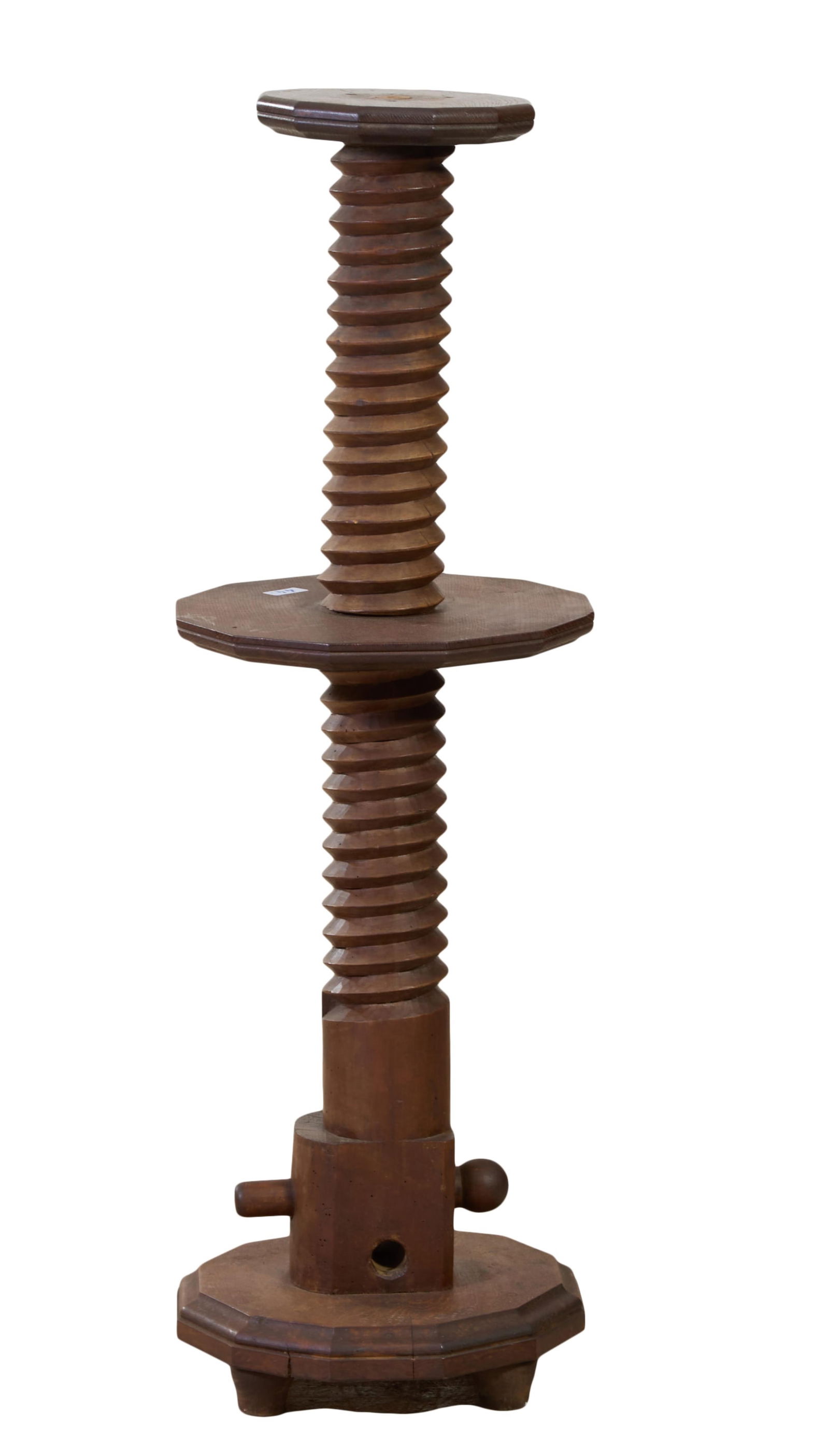French Provincial Carved Walnut Wine Press Screw Pedestal, late 19th c., H.- 42 1/2 in., Dia.- 14: French Provincial Carved Walnut Wine Press Screw Pedestal, late 19th c., the moulded dodecagon top over screw form standard, medial conforming shelf, shaped mechanical base, H.- 42 1/2 in., Dia.- 14 i