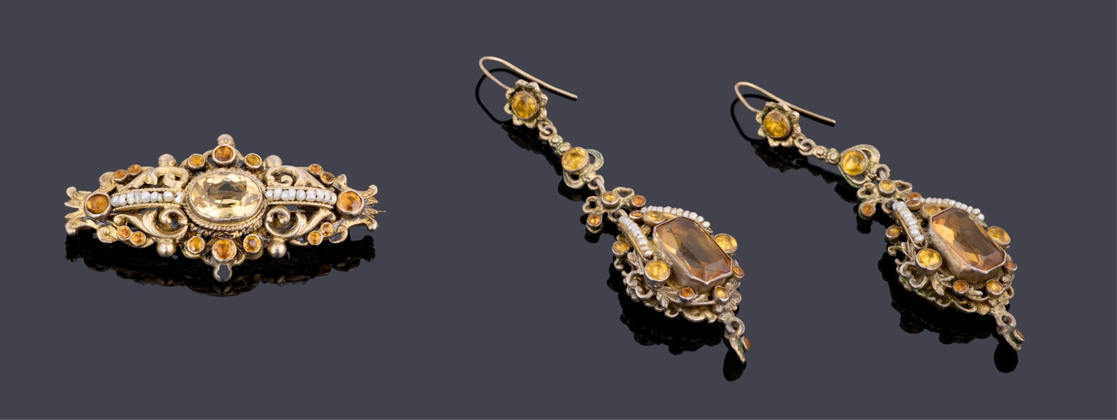 Three Piece Gold Vermeil Citrine and Seed Pearl Set, App. Wt.- 24.8 grams; Brooch- H.- 1 in., W.- 1: Three Piece Gold Vermeil Citrine and Seed Pearl Set, consisting of a brooch and a pair of pendant earrings, App. Wt.- 24.8 grams; Brooch- H.- 1 in., W.- 1 7/8 in.; Earrings- H.- 2 9/16 in., W.- 13/16 
