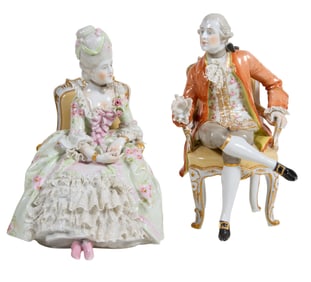 Two German Nymphenburg Porcelain Figures, 20th c., Man- H.- 7 1/2 in., W.- 5 1/2 in., D.- 5 in.;