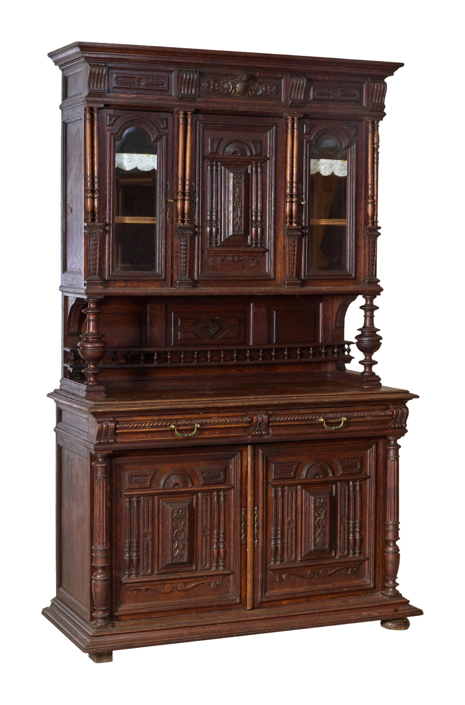 French Henri II Style Carved Walnut Buffet a Deux Corps, late 19th c., H.- 91 in., W.- 55 in., D.-: French Henri II Style Carved Walnut Buffet a Deux Corps, late 19th c., the architectonic superstructure with flared cornice, bracketed frieze, triple doors, flanked by four sets of double columnettes,