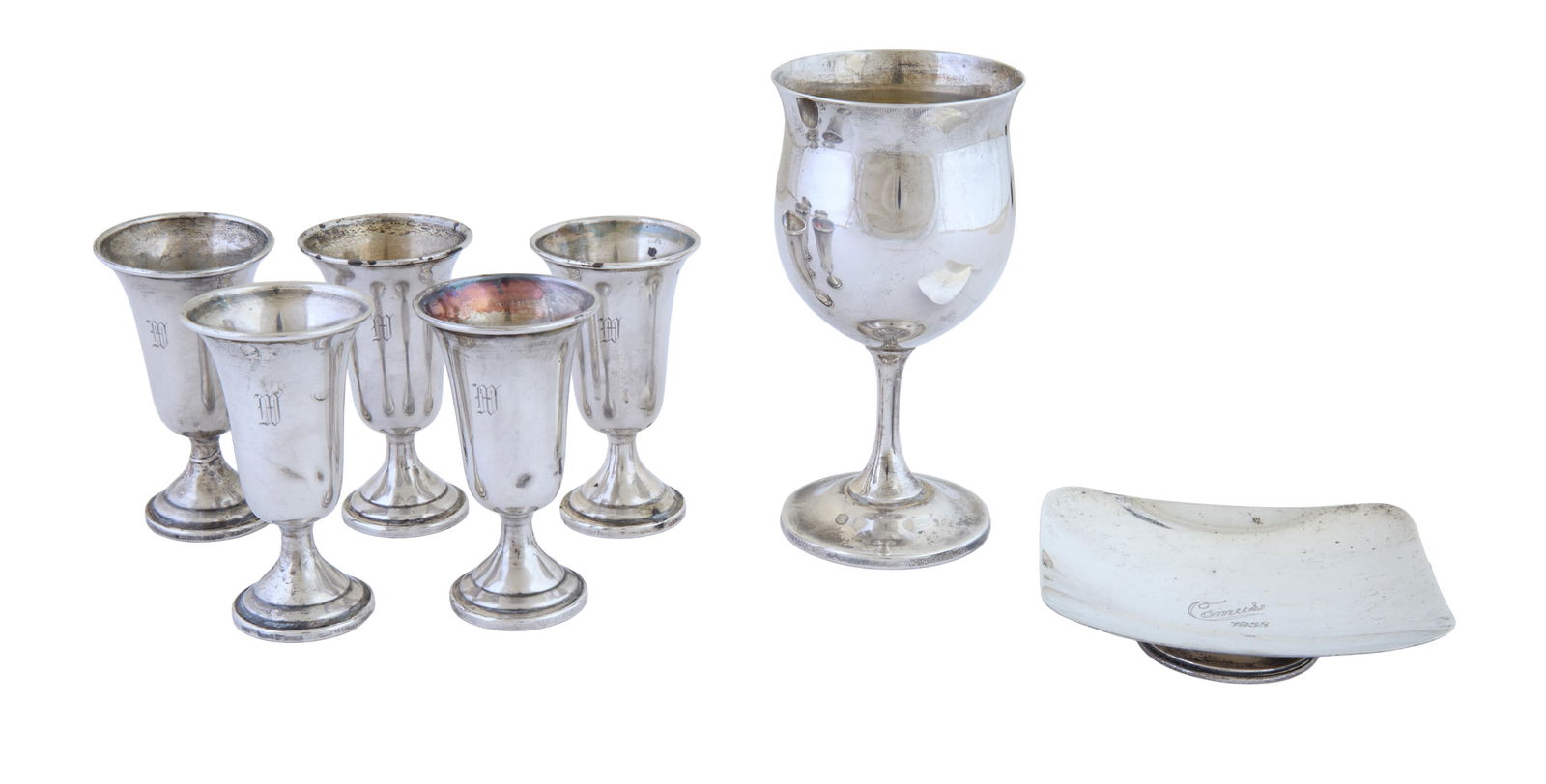 Group of Seven Pieces of American Sterling Tableware, 20th c., App. Weighable Sterling Wt.- 5.065: Group of Seven Pieces of American Sterling Tableware, 20th c., consisting of a Reed & Barton wine goblet, marked "REED & BARTON/ STERLING/ H122"; five weighted sterling stemmed digestif glasses by New